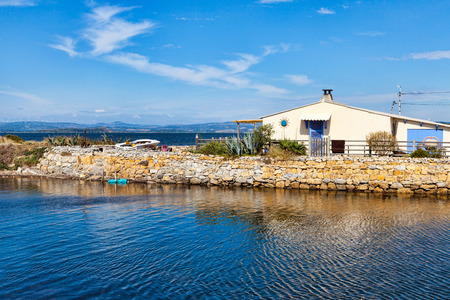 Beautiful small house, located at the Ãtang de l'Ayrolle near an old fishing village of the small village of Gruissan in the South of Franceの写真素材