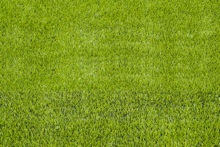 The detail of artificial green grass soccer field for backgroudの写真素材