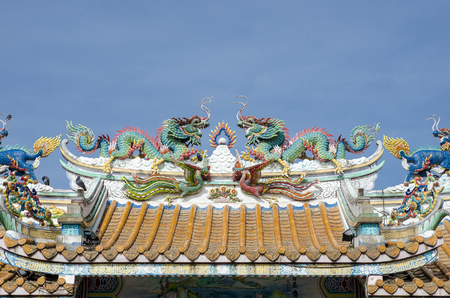 The Twin or Double Chinese dragon on the temple roofの写真素材