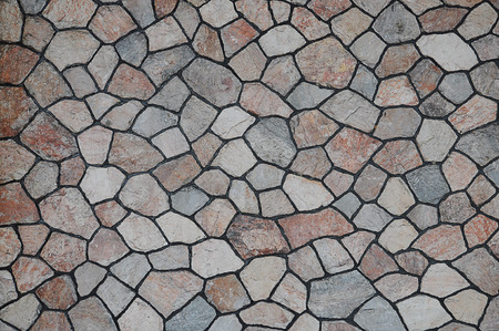 The pattern of  rustic natural stone wall , for background , texture , copy textの写真素材