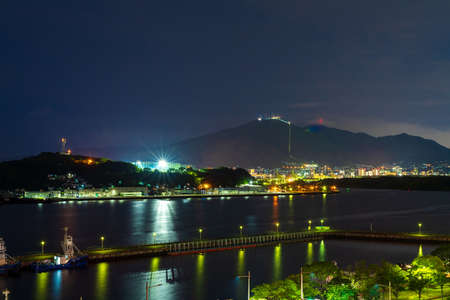 Beautiful night view of Donghai Bay and the cityのeditorial素材