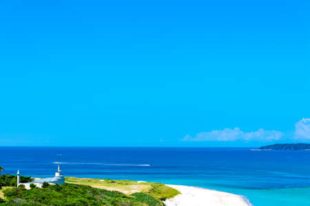 The blue sky, the sea and the coast of the beautiful Kadoshima Ohama beachの写真素材