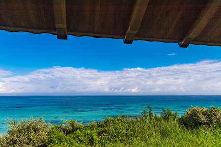 The blue sky, the sea and the coast of the beautiful Kadoshima Ohama beachの写真素材