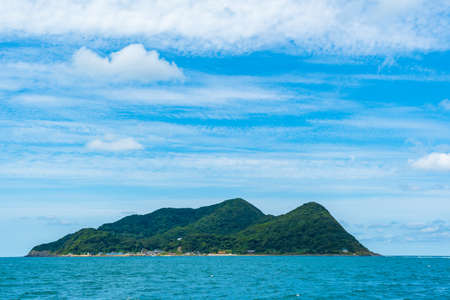Islands of genkai sea in beautiful blue sky in summerの写真素材