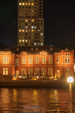 A romantic night view of the building lit up with bright glass lanterns and wooden illuminations at Mojiko Retroの写真素材