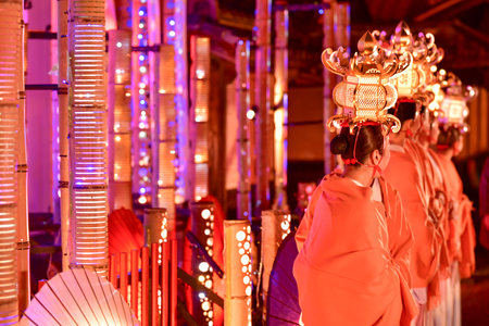 Beautiful festival lit up with bamboo lanterns and Japanese umbrellasのeditorial素材
