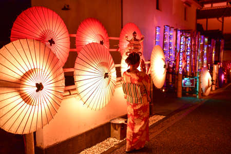 Beautiful festival lit up with bamboo lanterns and Japanese umbrellasのeditorial素材