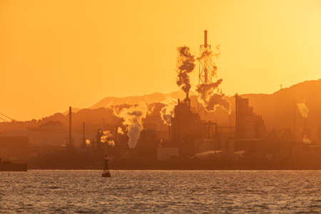 Factory and beautiful sunset in Kitakyushu Industrial Areaの写真素材
