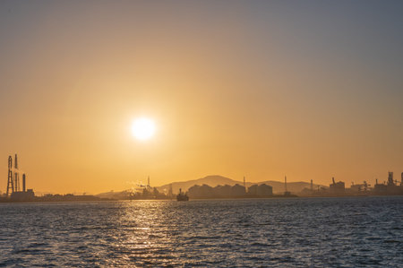 Factory and beautiful sunset in Kitakyushu Industrial Areaの写真素材