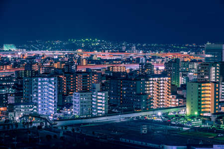 The lights and cityscape of the beautiful building street with a beautiful night view from Atago Shrine in Fukuoka City, a regional city in Japanのeditorial素材