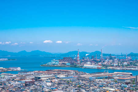 View of the summer blue sky and the industrial city of Kitakyushu, Fukuokaの写真素材