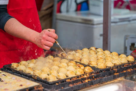 Takoyaki in a street stallの写真素材