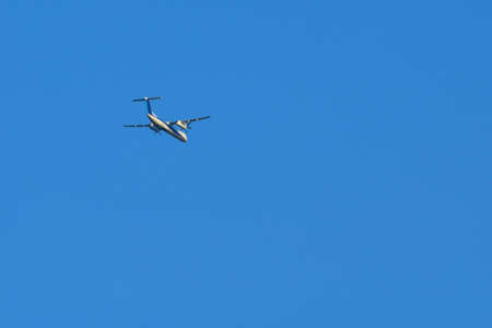 a jet flying in the blue skyのeditorial素材