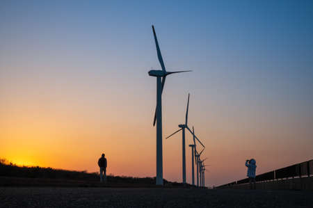 Sunset and Wind Powerの写真素材