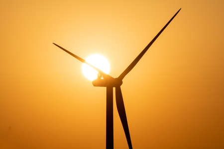 Sunset and Wind Powerの写真素材