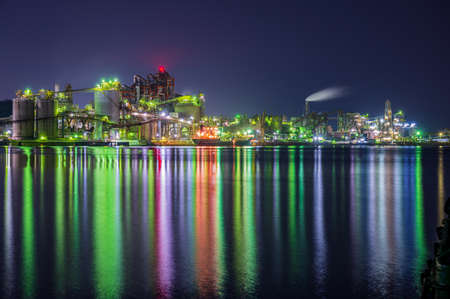 Night view of a beautiful factory in kitakyushu industrial zoneの写真素材