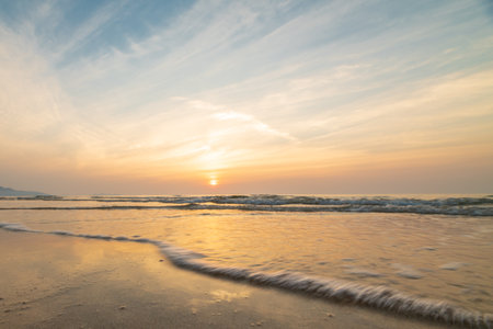Beautiful sunset and sandy beach and horizon of Iwaya coastの写真素材