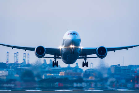 Jet flying off runwayの写真素材