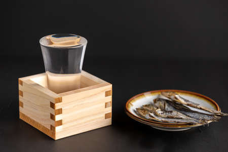 Sake and sardinesの写真素材