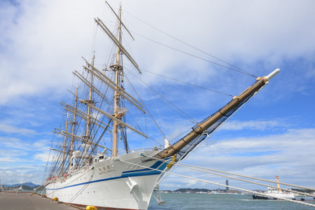 August 31, 2023, Japan, Fukuoka Prefecture, Kitakyushu City, Nippon Maru anchored on the west coast of Moji Port with blue skies and summer cloudsのeditorial素材