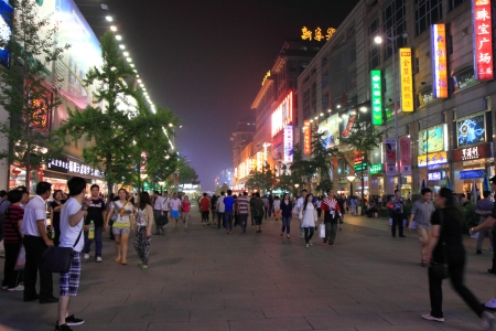 Beijing China - May 10,2012,Busy night scene of Wangfujing street, People enjoy shopping in Beijing Chinaのeditorial素材
