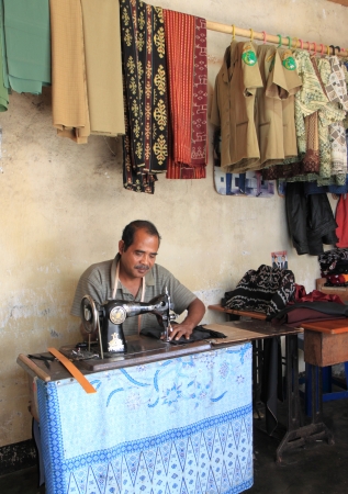 Flores Indonesia - May 04,2013,Local tailor working hard at local market in Bajawa Flores Indonesiaのeditorial素材