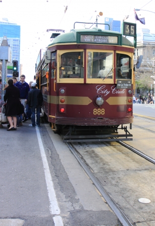 Melbourne Australia- August 10,2013, Passengers getting on and off at tram stop on La Trobe Street Melbourne Australiaのeditorial素材