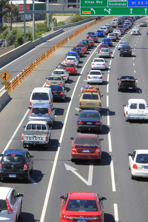 Melbourne Australia- October 12,2013,Weekend heavy traffic on M1 Freeway in Melbourne Australiaのeditorial素材