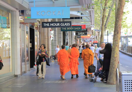 MELBOURNE AUSTRALIA - March 8, 2014  Unidentified monks walks down Collins Street Melbourneのeditorial素材