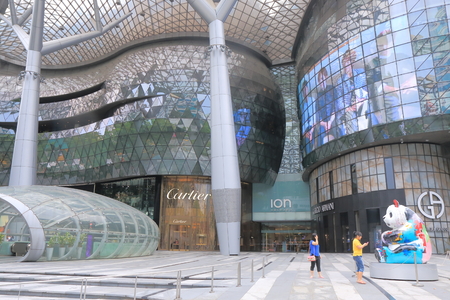 Singapore, Singapore - 26 May, 2014  Tourists sightsee contemporary ION Orchard department store in Orchard road Singapore  のeditorial素材