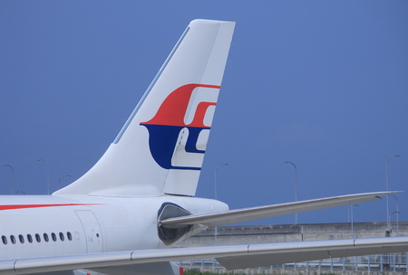 Osaka, Japan - 20 June, 2014  Malaysian airlines airplane parks at Kansai Airport in Osaka Japan  のeditorial素材