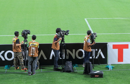 Melbourne Australia - January 20, 2015: TV camera crew work at Asian Cup football game in Australiaのeditorial素材