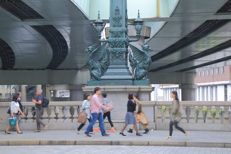 Tokyo Japan - May 9, 2015: People cross Nihonbashi bridge. Nihonbashi bridge was first constructed in 1603 and the current one constructed in 1915のeditorial素材