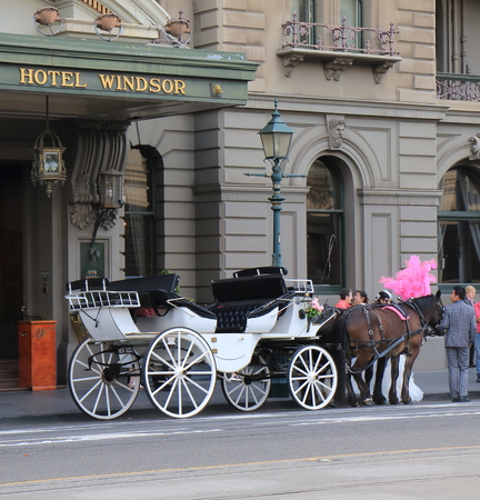 Melbourne Australia - September 19, 2015: Horse carriage parks at iconic The Hotel Windsor in Melbourne Australia.のeditorial素材