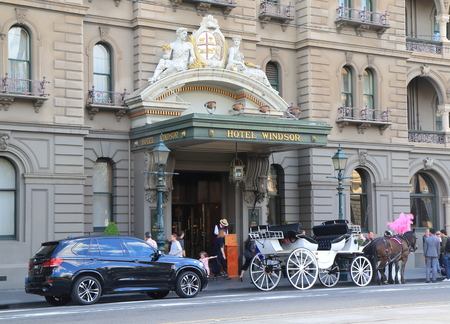 Melbourne Australia - September 19, 2015: Horse carriage parks at iconic The Hotel Windsor in Melbourne Australia.のeditorial素材