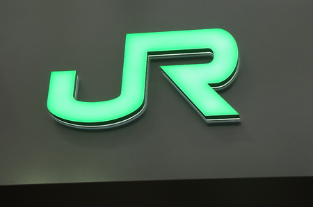 Tokyo Japan - September 23, 2016: JR Japanese train company logo Japan. Japan Railway Group JR lies at the heat of Japanese railway network.