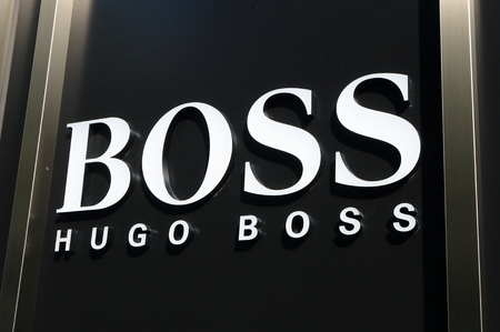 Osaka Japan - October 18, 2016: HUGO BOSS fashion brand logo. Hugo Boss often styled as BOSS, is a German luxury fashion house founded in 1924 by Hugo Boss.のeditorial素材
