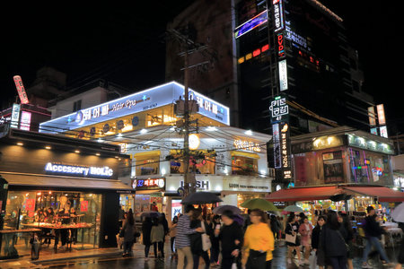 Seoul South Korea  October 23, 2016: Unidentified people visit Hongdae shopping street. Hongdae is known for its urban arts and indie music culture, clubs and entertainmentsのeditorial素材