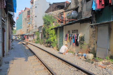 Hanoi Vietnam - Novrember 22, 2016: Unidentified people live along railway track in downtown Hanoiのeditorial素材