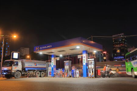 Ho Chi Minh City Vietnam - Novrember 25, 2016: Unidentified people buy gasoline at Petrolimex petrol gas station.のeditorial素材