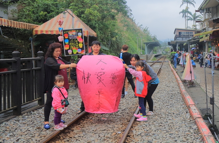 Taipei Taiwan - December 5, 2016: Unidentified people fly sky lantern in Pingxi. Pingxi is famous for sky lantern and the old street.のeditorial素材