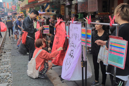 Taipei Taiwan - December 5, 2016: Unidentified people fly sky lantern in Shifen town. Shifen is an...