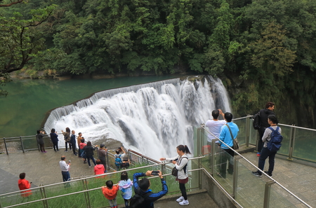 Taipei Taiwan - December 5, 2016: Unidentified people visit Shifen waterfall Scenic Area.のeditorial素材