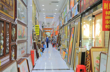 Guangzhou China - November 13, 2016: Unidentified people visit art shops on Cultural street. Cultural street is famous for Chinese art shops.のeditorial素材