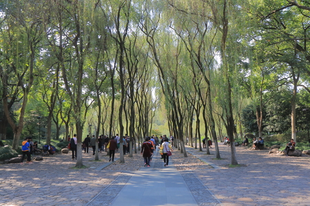 Hangzhou China - November 5, 2016: Unidentified people visit Xueshi Park West lakeのeditorial素材