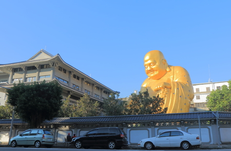 Taichung Taiwan - December 9, 2016: Unidentified people visit Bao Jue temple. Bao Jue temple is most famous for the presence of a giant smiling Buddha.のeditorial素材
