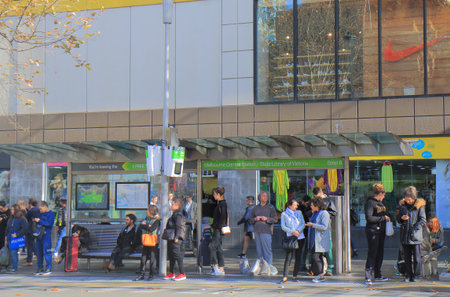 Melbourne Australia-June14, 2017: Unidentified people wait for tram in downtown Melbourne Australia.