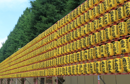Tokyo Japan - July 11, 2017: Lantern displays the name of people who gave financial donation to Yasukuni at the Shrine in Tokyo Japan.のeditorial素材
