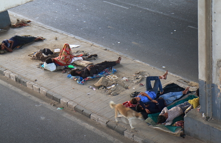 New Delhi India - October 30, 2017: People sleep on street in downtown New Delhi Indiaのeditorial素材