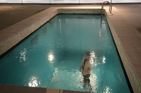 Kanazawa Japan - December 24, 2017: People visit optical illusion swimming pool at 21st Century...